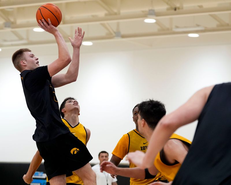 Iowa’s Bennett Stirtz (14) shoots the ball during practice June 19, 2025 at Carver-Hawkeye Arena in Iowa City, Iowa.