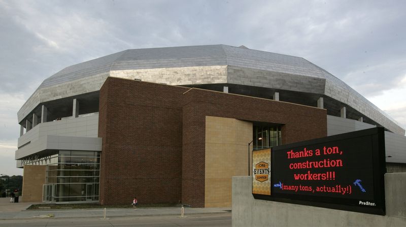 -

-Exterior Wells Fargo Arena -- Friday July 8, 2005 -- for special section -- Register photo by Rodney White-

- Finally, you can take a look inside the new Wells Fargo Arena in downtown Des Moines. Polk County will hold a community open house at 6 p.m. today. Special guests will be from the Iowa Stars, the Harlem Globetrotters and World Wrestling Entertainment. Admission is free. Was the arena worth its cost? -

-ran in rail