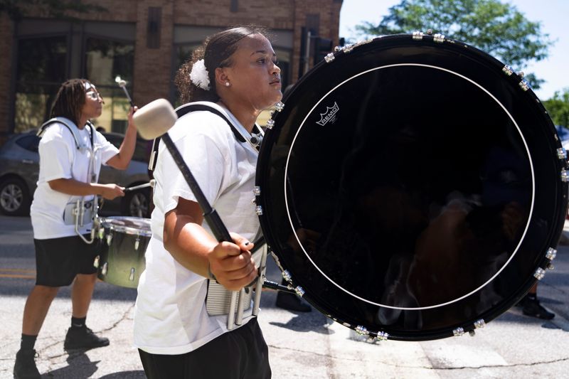 The Isiserettes Drill and Drum Corp performs during Juneteenth Neighbor's Day festival at Western Gateway Park on June 21, 2025, in Des Moines.