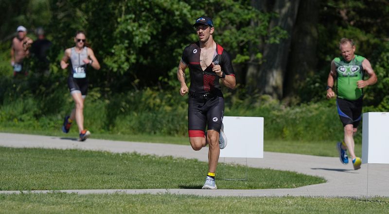 Athletes battle to finish the Ames Triathlon at Ada Hayden Park, June 22, 2025, in Ames, Iowa