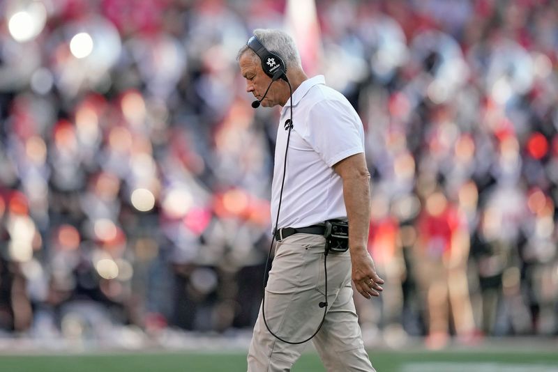 Oct 5, 2024; Columbus, OH, USA; Iowa Hawkeyes head coach Kirk Ferentz walks back to the sidelines after a time out against Ohio State Buckeyes in the third quarter during the NCAA football game at Ohio Stadium.