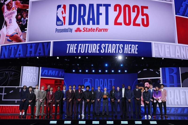 Jun 25, 2025; Brooklyn, NY, USA; The 2025 NBA Draft class and NBA commissioner Adam Silver stand on stage before the first round of the 2025 NBA Draft at Barclays Center. Mandatory Credit: Brad Penner-Imagn Images