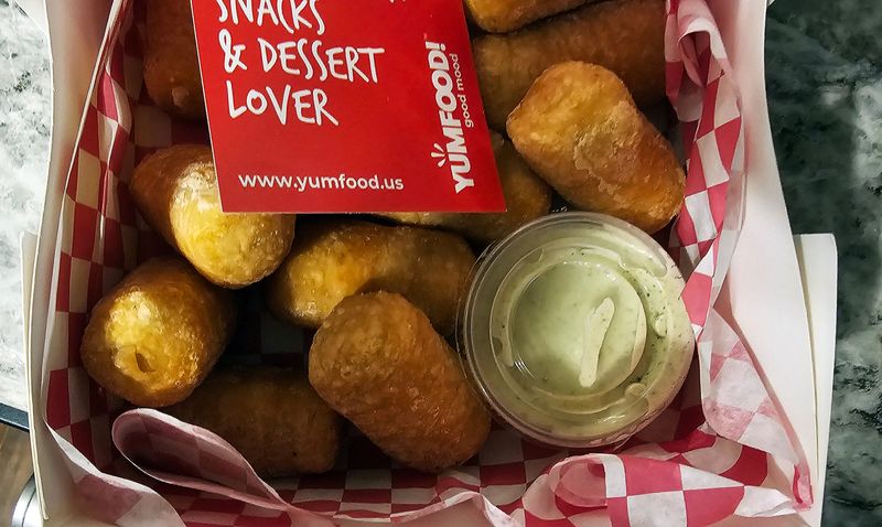 Savory tequeños from Yumfood, a home-based business from Patricia Reverol-Urdaneta in Urbandale, come with queso blanco fried inside and a homemade tartar sauce on the side.