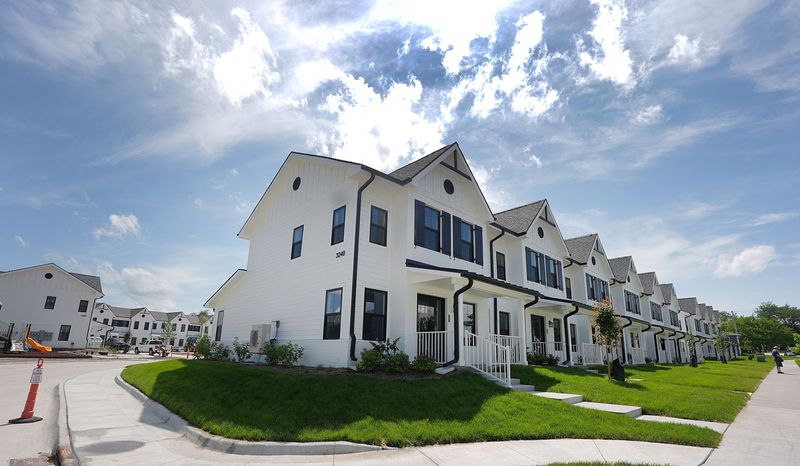 A grand opening ceremony was held June 25 for the new Townhomes at Creekside along Tripp Street in Ames, Iowa.