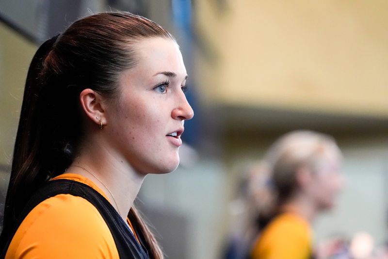 Iowa’s Taylor Stremlow talks to media members after practice June 26, 2025 at Carver-Hawkeye Arena in Iowa City, Iowa.