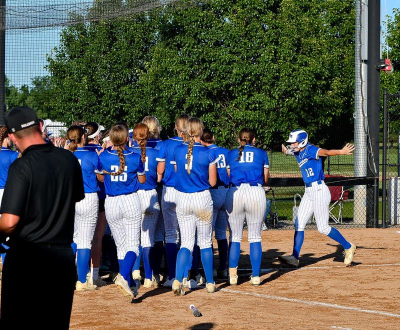 Van Meter softball survives 14 inning scare, baseball action heats up