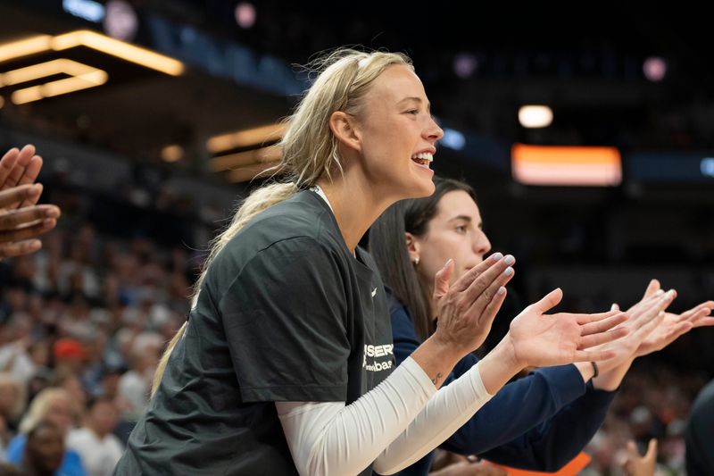 Jul 1, 2025; Minneapolis, Minnesota, USA; Indiana Fever guard Sophie Cunningham (8) celebrates a shot made from her teammates against the Minnesota Lynx in the second half during the Commissioner's Cup final at Target Center. Mandatory Credit: Jesse Johnson-Imagn Images