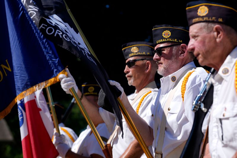 A color guard carries the colors during the 4thfest parade July 4, 2025 in Coralville, Iowa.