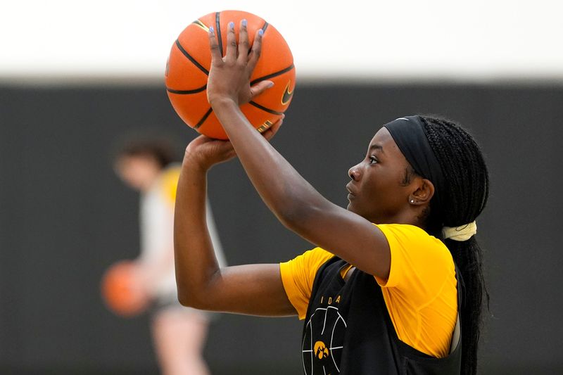 Iowa's Chazadi 'Chit-Chat' Wright shoots a free throw during a women's basketball practice July 1, 2025 at Carver-Hawkeye Arena in Iowa City, Iowa.