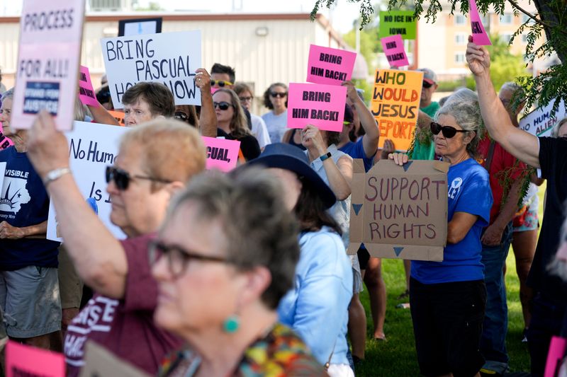 Community members gather for a protest calling for the immediate return of West Liberty resident Pascual Pedro July 9, 2025 outside the Immigration and Customs Enforcement office in Cedar Rapids, Iowa.