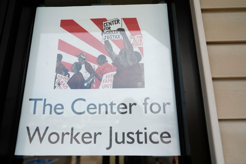 Signage for the Center for Worker Justice is pictured July 10, 2025 at 1556 S. First St. in Iowa City, Iowa.