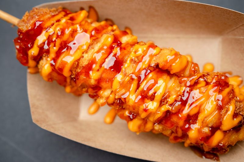 The potato half and half Korean corn dog from GoldenKDog, one of the 2025 top 11 Best New Foods competition semi-finalists at the Iowa State Fair, July 15, 2025, in Des Moines.