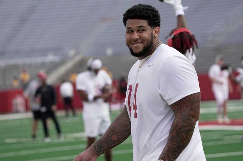 Sep 14, 2024; Madison, Wisconsin, USA; Alabama Crimson Tide offensive lineman Kadyn Proctor (74) is shown before a game against the Wisconsin Badgers at Camp Randall Stadium. Mandatory Credit: ?Mark Hoffman/USA TODAY Network via Imagn Images