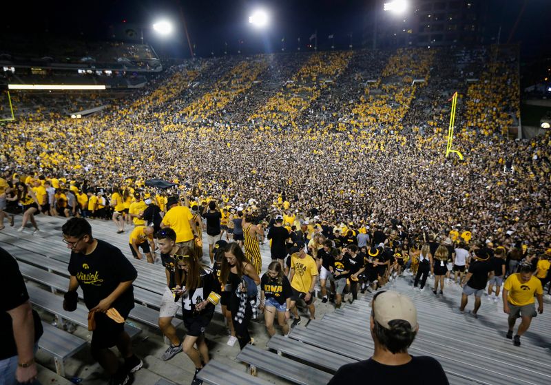 Iowa fans make their way out of Kinnick Stadium as a sea of yellow and black remains on the field after No. 3-ranked Iowa beat No. 4 Penn State, 23-20, in Iowa City, Iowa, on Saturday, Oct. 9, 2021.

20211009 Iowavspennstate