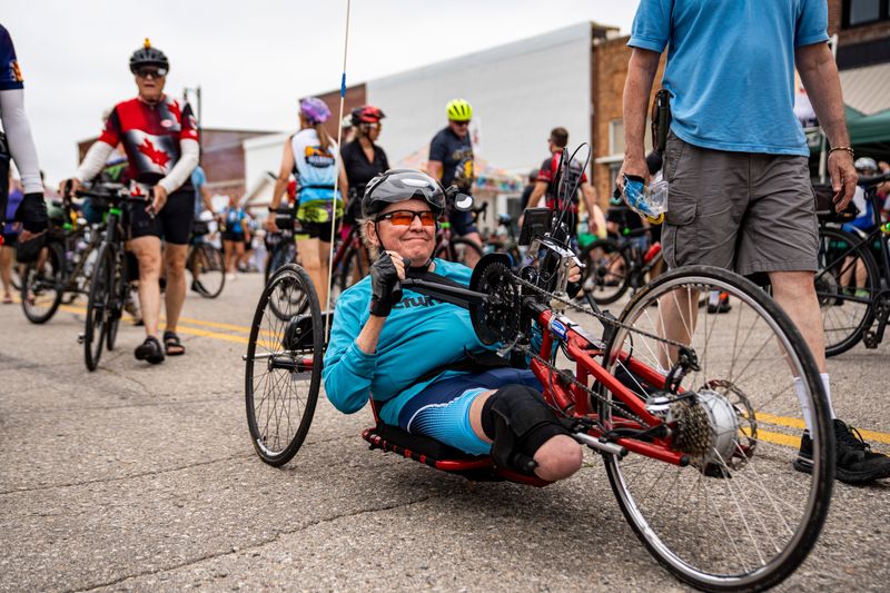 Andy Bales rides down Central Avenue in Hartley during Day 1 of RAGBRAI 52 on Sunday July 20.