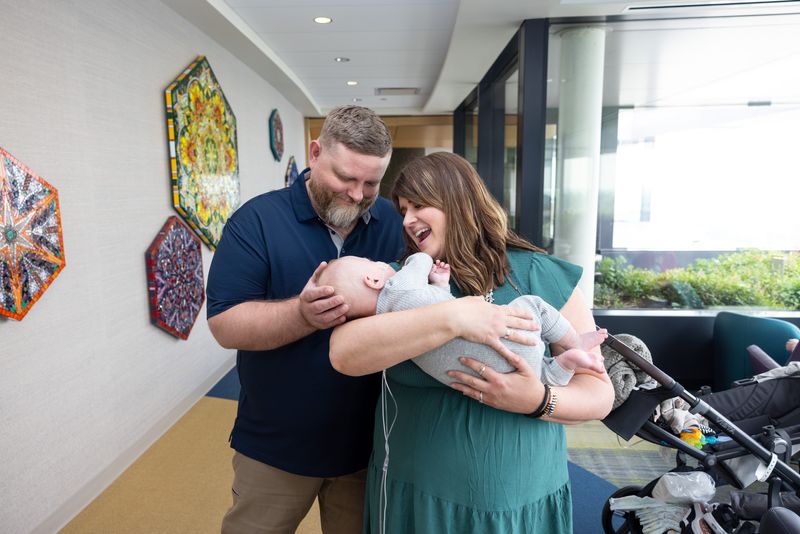 Nash Keen with his parents Mollie and Randall Keen at University of Iowa Health Care Stead Family Children’s Hospital on Wednesday, June 4, 2025. Nash was born in July 2024 as the earliest baby ever born at 21 weeks, 0 days gestation. He has survived with very minimal complications and is home and thriving.