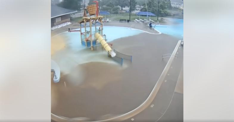 A screengrab of security cameras at Holiday Park Aquatic Center shows mud filling the pool during heavy rain on Sunday, July 20, 2025.