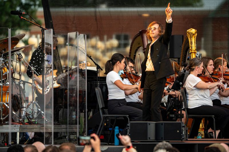 Beck performs with the Des Moines Symphony on July 24, 2025, at Lauridsen Amphitheater in Water Works Park in Des Moines, Iowa. The symphony was conducted by Edwin Outwater.