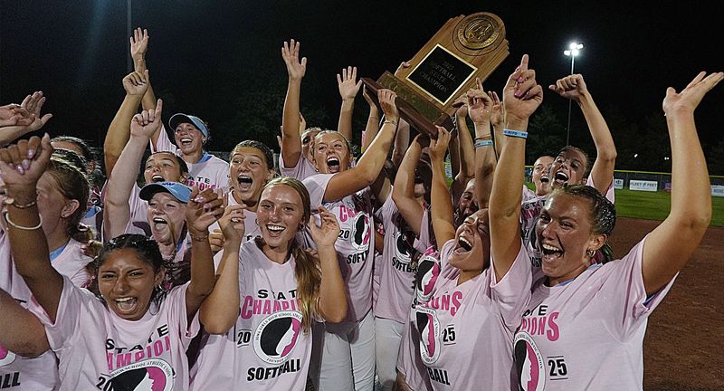 The Waukee Northwest softball team celebrates after winning 1-0 over Linn Mar in the Class 5A Iowa high school state softball all championship game on July 24 in Fort Dodge. The win is the second state title for the Wolves and the first since 2022.