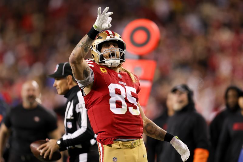 Dec 30, 2024; Santa Clara, California, USA; San Francisco 49ers tight end George Kittle (85) celebrates after a play during the first quarter against the Detroit Lions at Levi's Stadium.