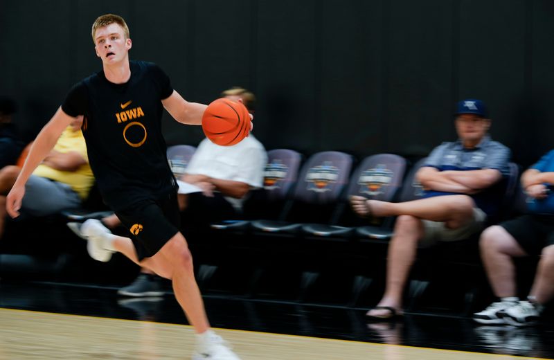Iowaâ€™s Bennett Stirtz (14) brings the ball up court during practice June 19, 2025 at Carver-Hawkeye Arena in Iowa City, Iowa.