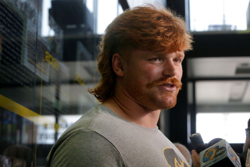Iowaâ€™s offensive lineman Gennings Dunker speaks to the media Tuesday, July 16, 2024 in Iowa City, Iowa.