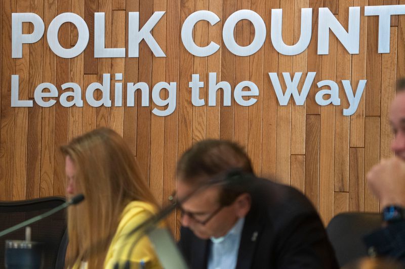 The Polk County slogan "Leading the Way" is seen on the wall during a Polk County Board of Supervisors meeting at the Polk County Administration Building on July 29, 2025, in Des Moines.