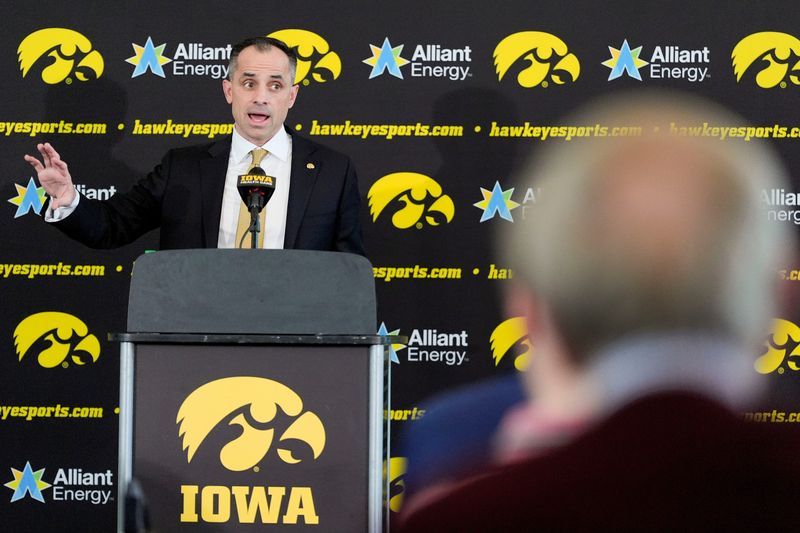 Ben McCollum, Iowa's new head men's basketball coach, speaks during his introductory press conference Tuesday, March 25, 2025 at Carver-Hawkeye Arena in Iowa City, Iowa.