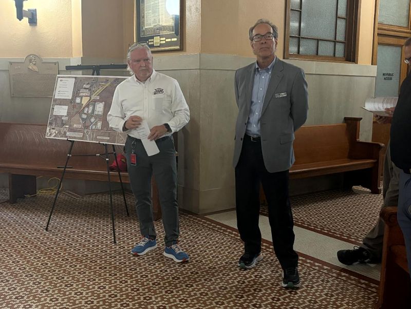 Jim Bowman, senior director of economic and site development at Iowa Interstate Railroad (left), and Jeff Davidson, executive director of the Jasper County Economic Development Corp., announce the new Newton Rail Park on Wednesday, July 30, 2025, in Newton.