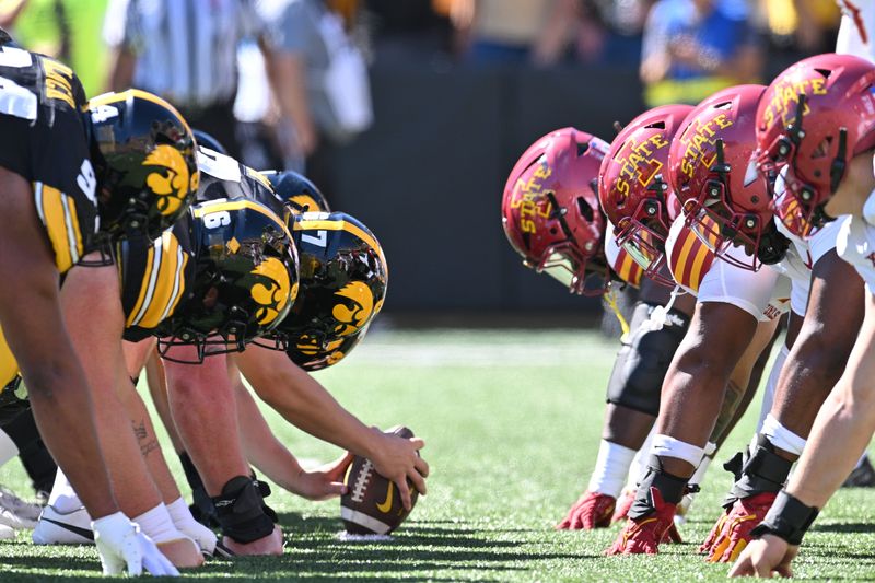 Sep 7, 2024; Iowa City, Iowa, USA; The line of scrimmage between the Iowa Hawkeyes and the Iowa State Cyclones during the first quarter at Kinnick Stadium. Mandatory Credit: Jeffrey Becker-Imagn Images