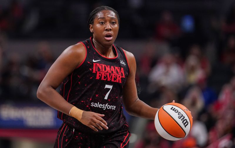 Indiana Fever forward Aliyah Boston (7) rushes up the court Wednesday, July 30, 2025, during the game at Gainbridge Fieldhouse in Indianapolis. The Indiana Fever defeated the Phoenix Mercury, 107-101.