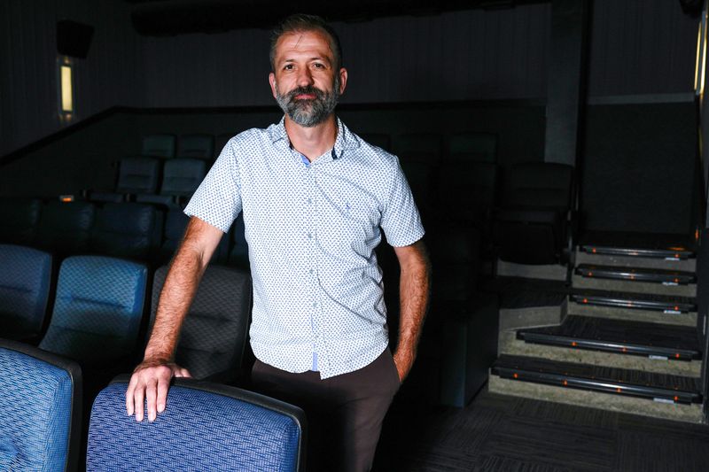 FilmScene Executive Director and Co-Founder Andrew Sherburne is pictured at the Pedestrian Mall location Aug. 5, 2025 in downtown Iowa City, Iowa.