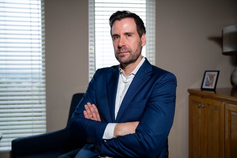 State Rep. Josh Turek poses for a portrait on Aug. 11, 2025, at his home in Council Bluffs, Iowa.