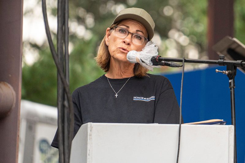 Iowa Gov. Kim Reynolds speaks during the Veterans Band and Military Tribute Concert on the fifth day of the Iowa State Fair on Aug. 11, 2025, in Des Moines.