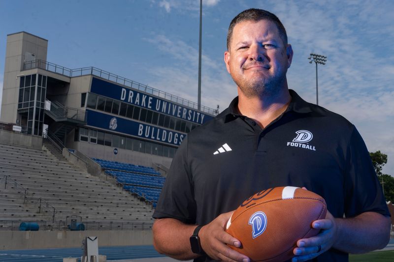 Drake football head coach Joe Woodley poses for a portrait during Drake football media day at Drake Stadium on Aug. 14, 2025, in Des Moines.