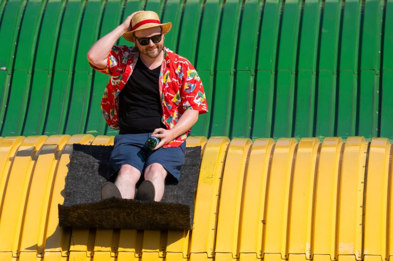 Michael Carpenter, of Elkhart, rides the Giant Slide during the tenth day of the Iowa State Fair on Aug. 16, 2025, in Des Moines.