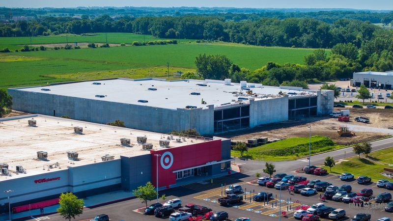 A 91,000-square-foot Furniture Mart being built on the north side of S.E. 5th Street between Target and Walmart is expected to open in November 2025.
