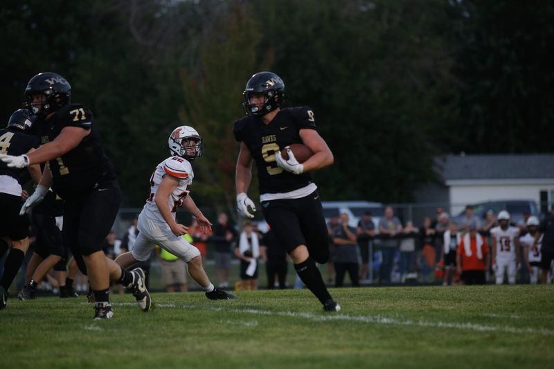 Woodward-Granger's Kane Mahler-Moreno on an end-around two-point conversion on Aug. 29, 2025, at Hawk Stadium.