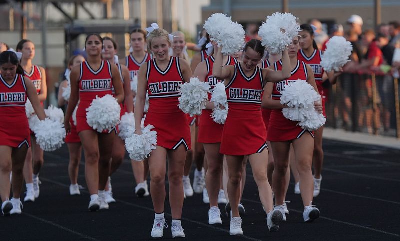 Gilbert cheerleaders cheer during the Gilbert and Carroll football game at Tiger Stadium on August 29, 2025, in Gilbert, Iowa.