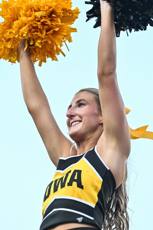Aug 30, 2025; Iowa City, Iowa, USA; Iowa Hawkeye cheerleaders react to the crowd during the second quarter against the Albany Great Danes at Kinnick Stadium. Mandatory Credit: Jeffrey Becker-Imagn Images