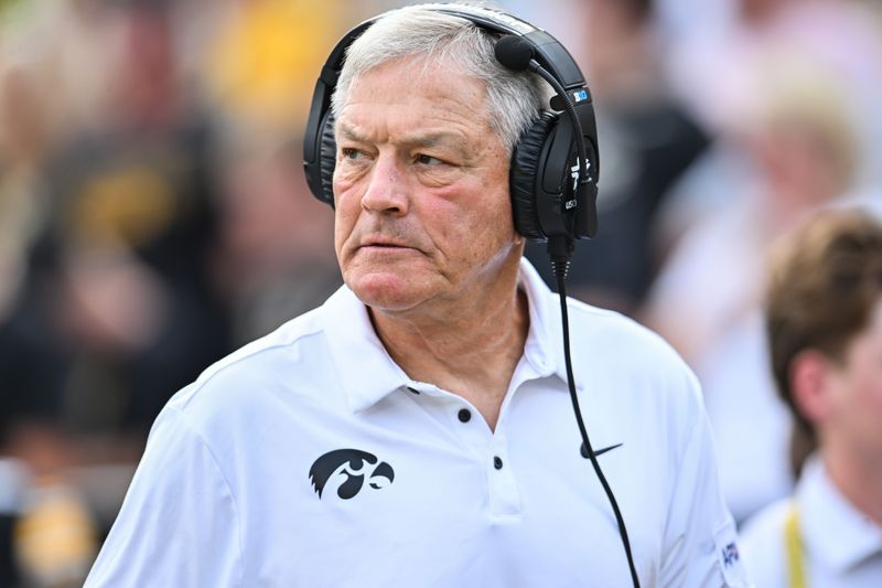 Aug 30, 2025; Iowa City, Iowa, USA; Iowa Hawkeyes head coach Kirk Ferentz looks on before the game against the Albany Great Danes at Kinnick Stadium. Mandatory Credit: Jeffrey Becker-Imagn Images
