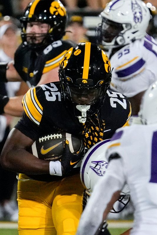 Iowa Hawkeyes running back Nathan McNeil (25) carries the ball against the Albany Great Danes Aug. 30, 2025 at Kinnick Stadium in Iowa City, Iowa.