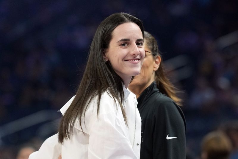 Aug 31, 2025; San Francisco, California, USA; Indiana Fever guard Caitlin Clark (22) walks to the bench before the game against the Golden State Valkyries at Chase Center. Mandatory Credit: Darren Yamashita-Imagn Images
