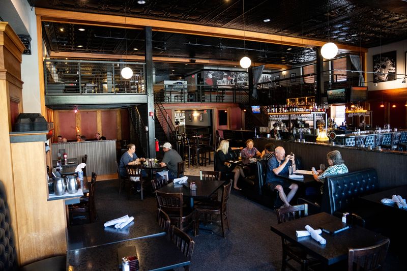 Diners eat lunch at Americana on Sept. 2, 2025, in Des Moines’ Western Gateway. The restaurant will close after its service on September 7.
