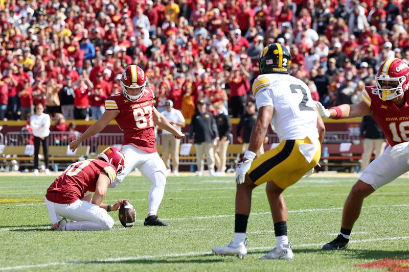 Sep 6, 2025; Ames, Iowa, USA; Iowa State Cyclones place kicker Kyle Konrardy (97) attempts a field goal against the Iowa Hawkeyes during the first quarter at Jack Trice Stadium. Mandatory Credit: Reese Strickland-Imagn Images
