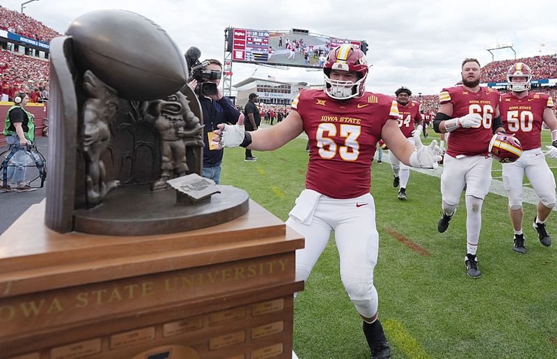 The Iowa State football team celebrates after beating Iowa, 16-13 at Jack Trice Stadium on Sept. 6, 2025, in Ames, Iowa