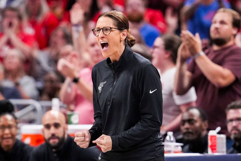 Indiana Fever head coach Stephanie White celebrates Friday, July 11, 2025, during a game between the Indiana Fever and the Atlanta Dream at Gainbridge Fieldhouse in Indianapolis. The Indiana Fever defeated the Atlanta Dream, 99-82.
