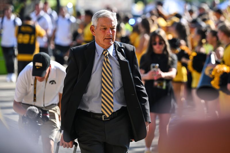 Sep 13, 2025; Iowa City, Iowa, USA; Iowa Hawkeyes head coach Kirk Ferentz enters Kinnick Stadium before the game against the Massachusetts Minutemen. Mandatory Credit: Jeffrey Becker-Imagn Images