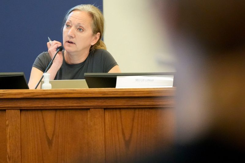 Board member Jayne Finch listens during an Iowa City Community School District board meeting Sept. 9, 2025 in Iowa City, Iowa.