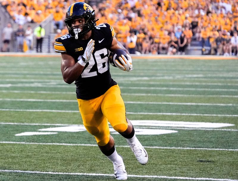 DUPLICATE***Iowa Hawkeyes running back Xavier Williams (26) runs with the ball during a football game against the Massachusetts Minutemen Sept. 13, 2025 at Kinnick Stadium in Iowa City, Iowa.